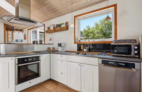 Skaven Strand House | Tranquil Vacation Home with Ocean View and Spa Amenities