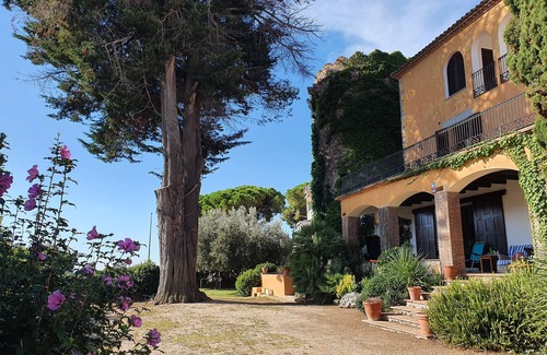 Caldes d'Estrac Villa | Enchanting Medieval Tower Home with Oceanfront Views
