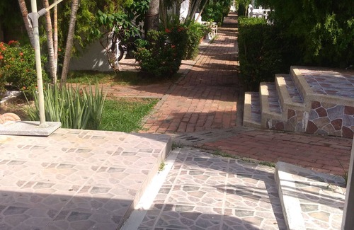 Girardot House | Inviting House for Summer Getaways with Pool & Spa