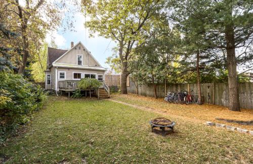 Traverse City House | Charming Home with AC, Fire Pit & Walkable Location