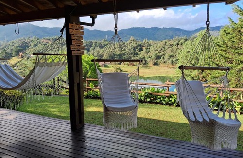 Guatape Villa | Tranquil Lake View Villa with Hot Tub & Town Access