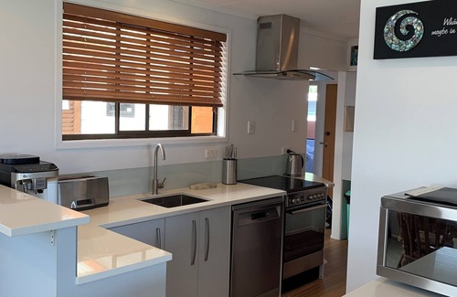 Hannahs Bay House | Scenic Lakefront Retreat with Pool and Spa Amenities