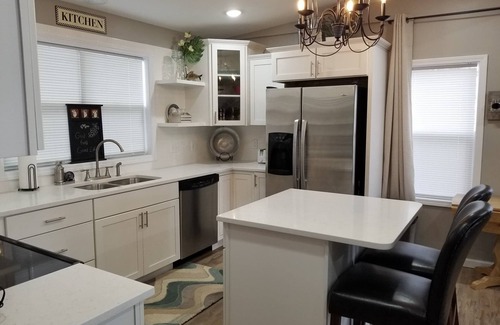 Marion House | Secluded Lakefront Home with Private Dock & Spa Amenities