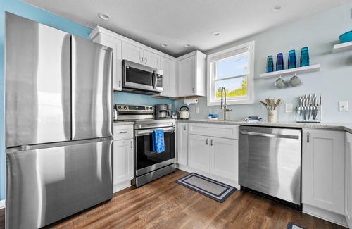 Cadillac House | Idyllic Lakefront Getaway with Breakfast & Family Amenities