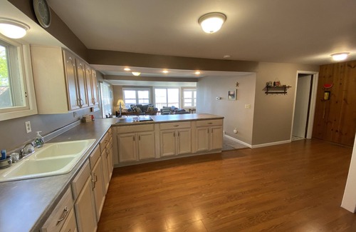 Ripon House | Elegant Lakefront Retreat on Big Green Lake with Pool