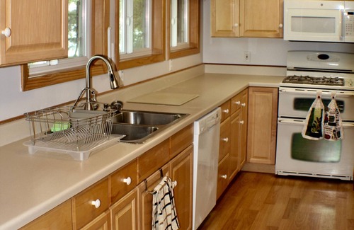 Grand Rapids House | Tranquil Lakeside Log Cottage with Ocean View & Pet Friendly