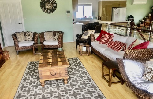 Malua Bay House | Spacious Home with Sea Views, Sleeps 12 & Pet Friendly