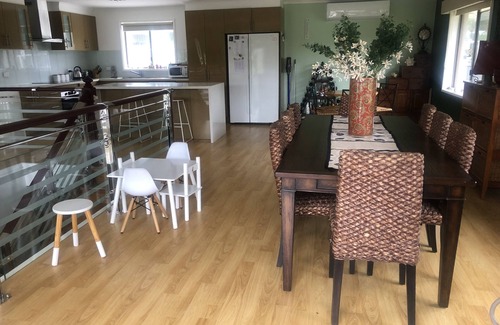 Malua Bay House | Spacious Home with Sea Views, Sleeps 12 & Pet Friendly