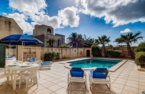 Ta' Għammar House | Inviting Pool Villa with Ocean View and Private Terrace