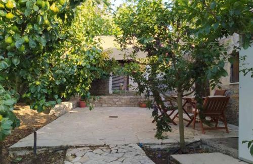 Trifylia Apartment | Cozy Stone House: Pet & Child Friendly Retreat Awaits