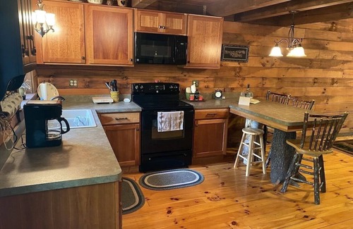 Logan Cabin | Romantic Log Cabin Getaway with Spa and Hot Tub Oasis