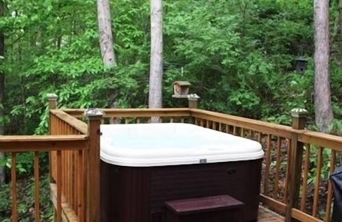 Logan Cabin | Romantic Log Cabin Getaway with Spa and Hot Tub Oasis