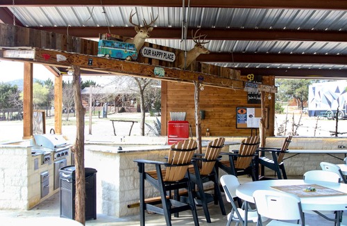 Pipe Creek Cabin | Charming Log Cabin with Pool and Kitchen Overlooking Meadow