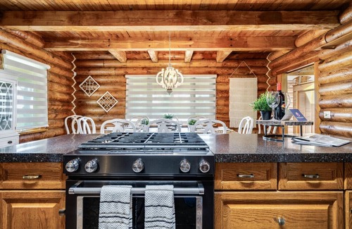 Kingsville House | Inviting Log House with Hot Tub and Fire Pit Oasis