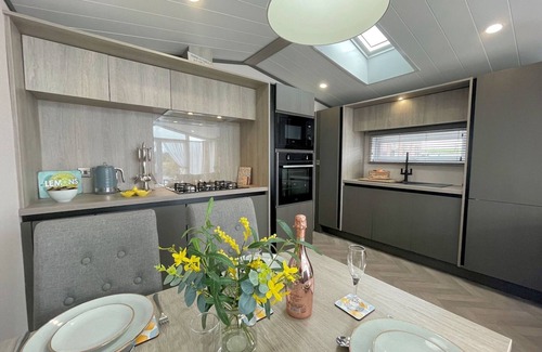 Lockerbie House | Picturesque Lakeside Lodge with Hot Tub and Scenic Views