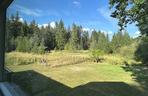 Port Alberni House | Inviting Master Bedroom with Ensuite and Private Balcony