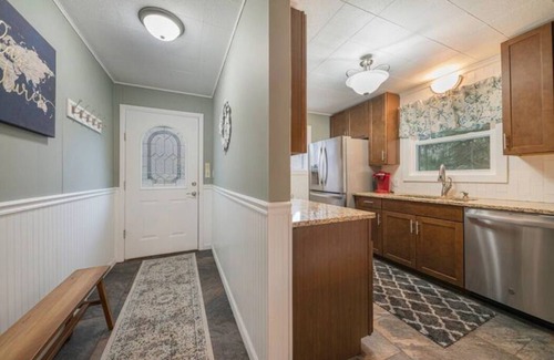 White Cloud Cottage | Exceptional Michigan River Home with Family-Friendly Amenities