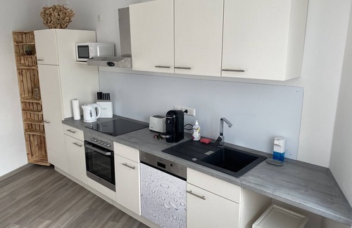 Surheide Apartment | Modern 2-Room Apartment with Roof Terrace & Ocean View