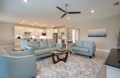 River Hall House | Elegant Country Club Retreat with Pool and Spa Amenities