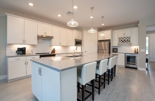 River Hall House | Elegant Country Club Retreat with Pool and Spa Amenities