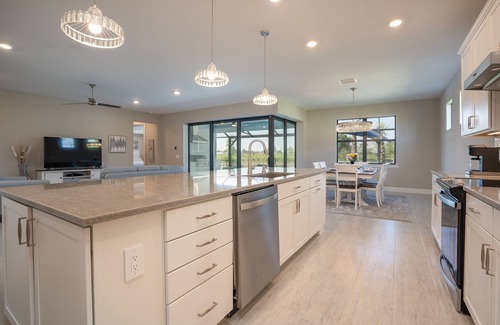 River Hall House | Elegant Country Club Retreat with Pool and Spa Amenities