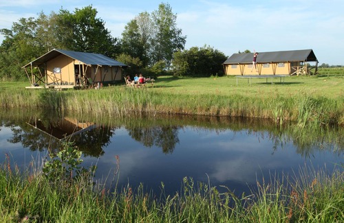 Enumatil Cabin | Unique Safari Tent & Circus Wagon with Private Bathroom