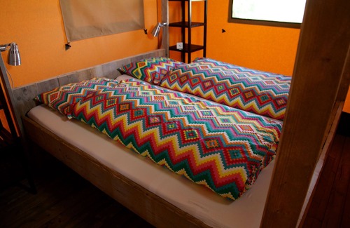 Enumatil Cabin | Unique Safari Tent & Circus Wagon with Private Bathroom