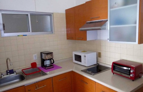 Lomas de Costa Azul Apartment | Scenic Ocean Views at Bella Vista Apartment with Pool Access