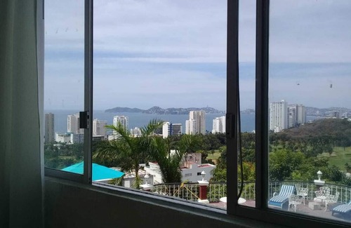 Lomas de Costa Azul Apartment | Scenic Ocean Views at Bella Vista Apartment with Pool Access