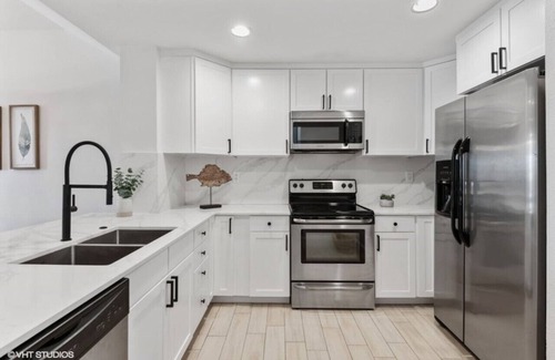 Rock Harbor House | Elegant Marina Villa at Mariner's Club with Ocean Views