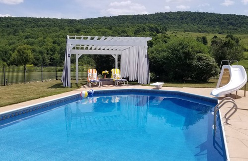 Cooperstown House | Tranquil Rustic Retreat with Pool & Driving Range, 9.8 Rated