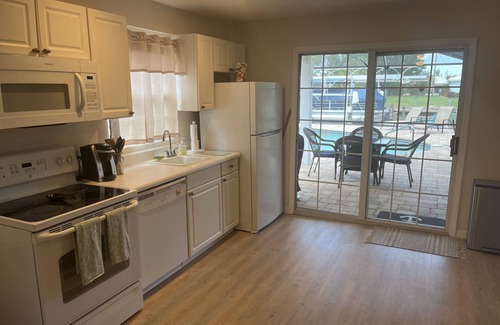 Bokeelia Apartment | Idyllic Canal Home with Pool & 45-Foot Boat Dock