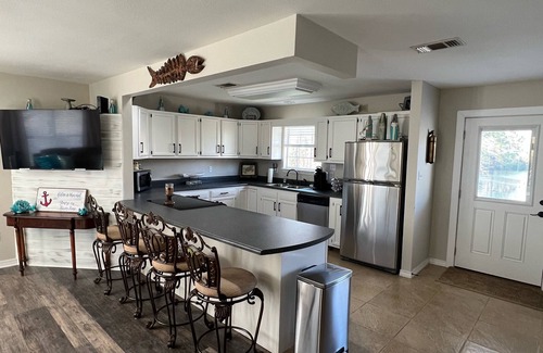 Gulfport House | Elegant River House Retreat with Pool and Ocean Views