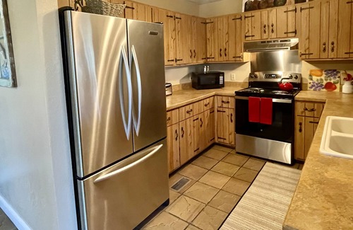 Mammoth Spring House | Idyllic Riverside Retreat with Spa and Family Amenities