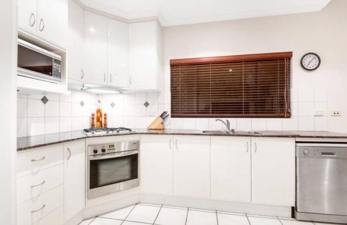 Cullen Bay House | Inviting Waterfront Home at Cullen Bay Marina with Pool