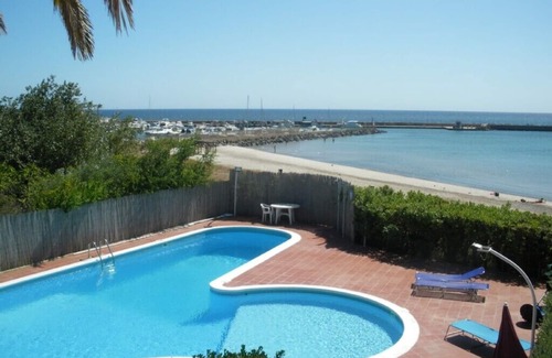 Sarroch Villa | Idyllic Split Villa with Beach Access, Pool & Tennis Court