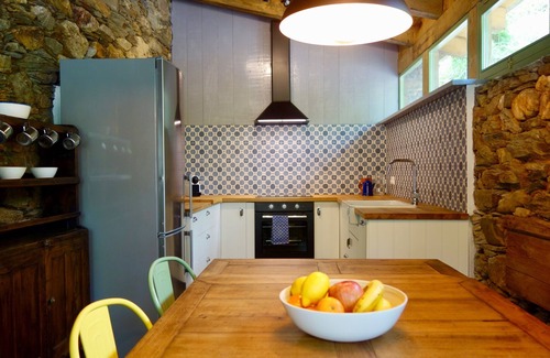 Ortigueira House | Chic Newly Restored Watermill with River Views and Spa