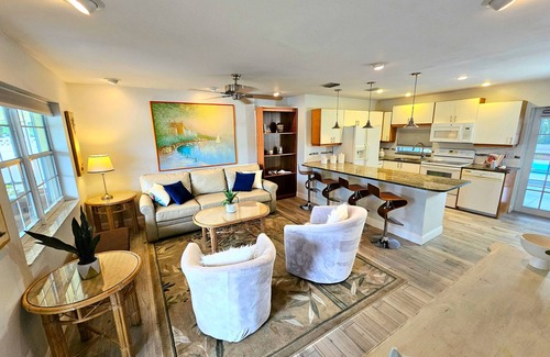 North Palm Beach House | Inviting Suite with Heated Pool, Steps from the Beach