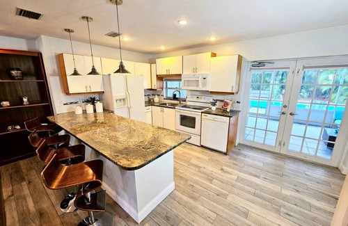 North Palm Beach House | Inviting Suite with Heated Pool, Steps from the Beach
