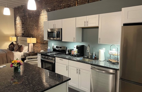 Downtown Syracuse Apartment | Beautiful Suite with Balcony overlooking Warren St in Syracuse