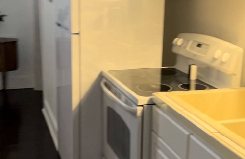 Bloomfield Apartment | Elegant Suite with Separate Bedroom & Family-Friendly Amenities