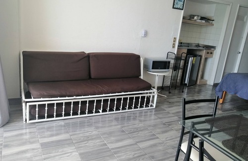 Club Deportivo Apartment | Inviting Twin Towers Suite with Balcony & Sea View Awaits