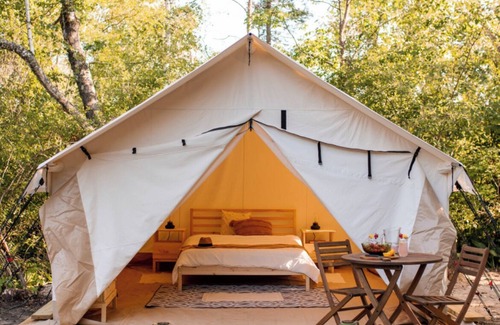 Campbellsport RV Rental | Inviting Tent at Camp Northern Lights - Guest Rated 9.8