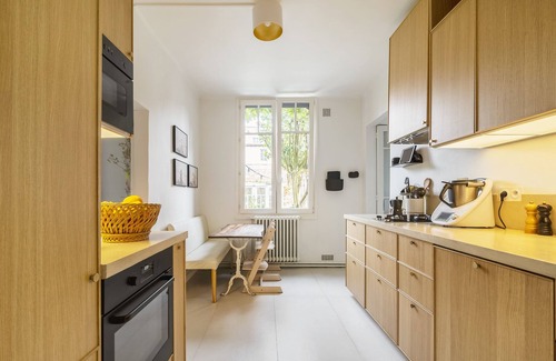 Fer a Cheval House | Charming Townhouse with Garden, Steps from City Center