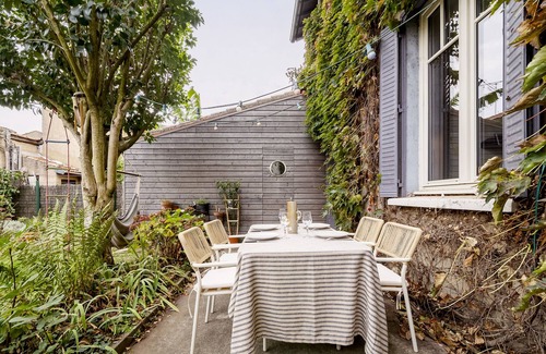 Fer a Cheval House | Charming Townhouse with Garden, Steps from City Center