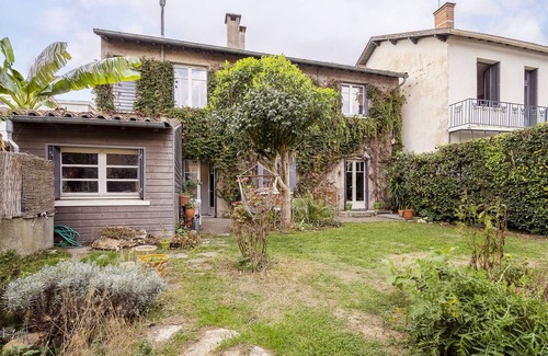 Fer a Cheval House | Charming Townhouse with Garden, Steps from City Center