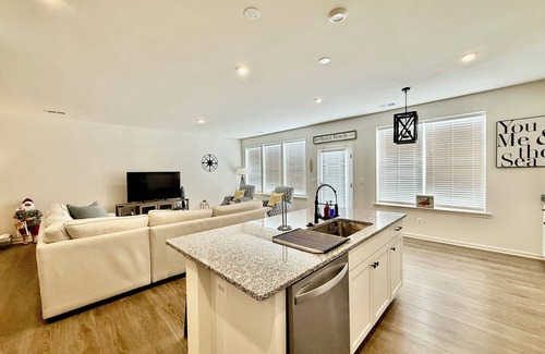 Millville House | Beautiful townhome with community pool, shuttle to Bethany, and more!
