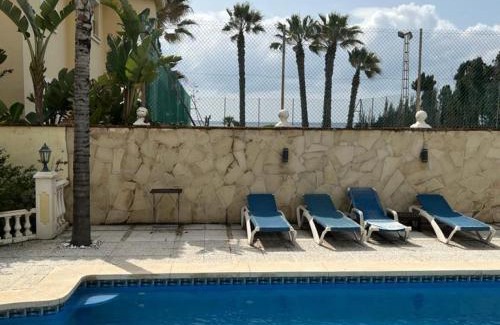 Urbanizacion Marbessa Villa | Idyllic Villa Steps from the Beach with Ocean View