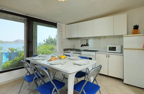 Costa Corallina House | Exceptional Oceanfront Villa for 6 with TV and Patio