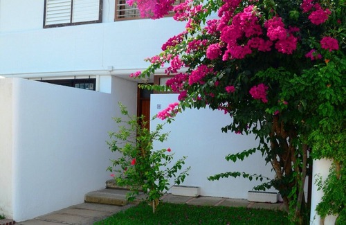 Punta Umbria Ski Chalet | Cozy Villa Steps from the Beach with Pool and Ocean View